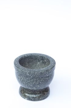 Stone mortar on white background, stock photo