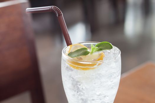 Glass of iced honey lemon soda, stock photo