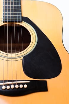 Acoustic guitar on white background, stock photo