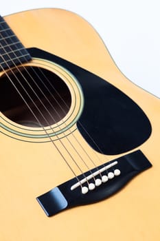 Acoustic guitar on white background, stock photo