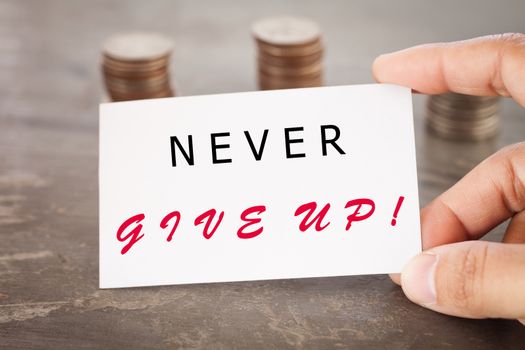 Never give up inspirational quote, stock photo