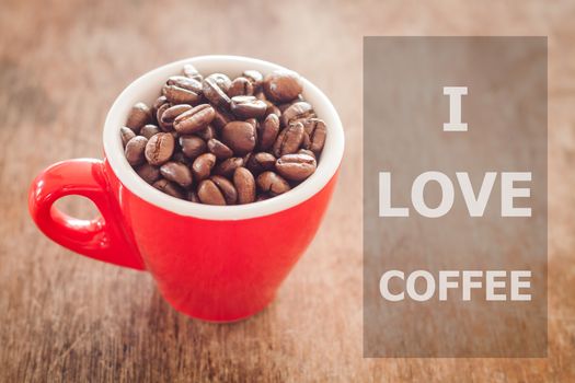 I love coffee inspirational quote on coffee cup background