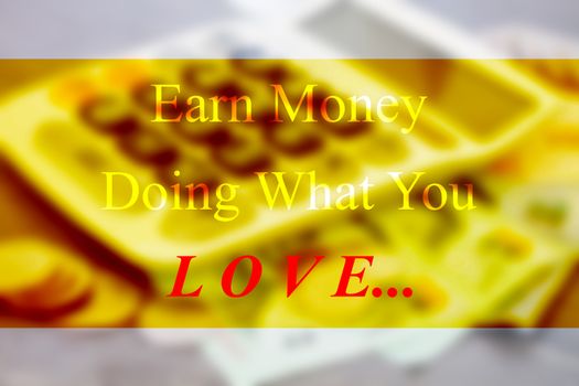 Earn money doing what you love inspirational quote on blur background