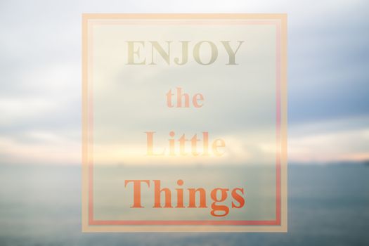 Inspirational quote of enjoy the little things on blue sea background