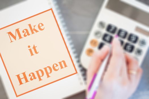 Make it happen inspirational quote on blurred background