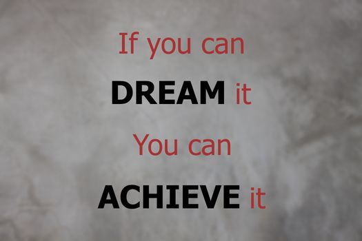 Inspirational quote of if you can dream it you can achieve it on grey background