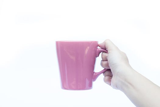 Woman hands holding coffee cup on white background