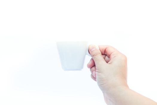 Woman hands holding coffee cup on white background