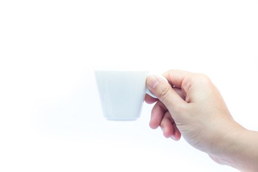 Woman hands holding coffee cup on white background