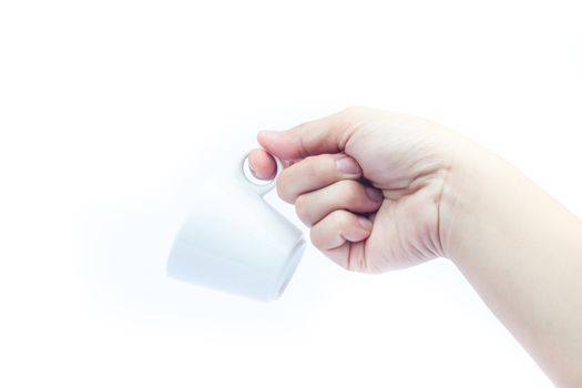 Woman hands holding coffee cup on white background