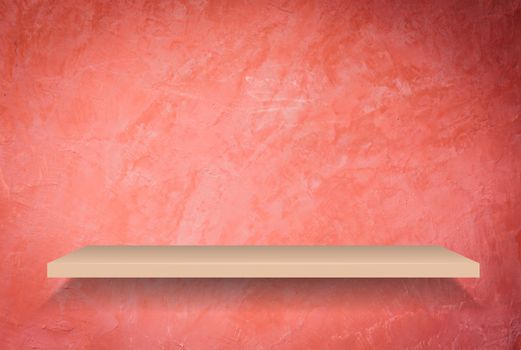 Empty shelf on handmade creative red wall background