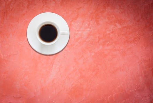 Top view of white coffee cup on red background, stock photo