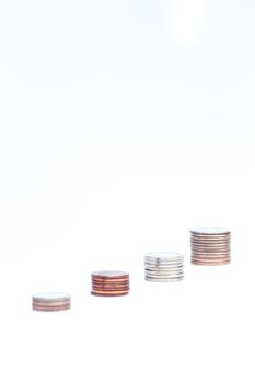 Money coin growing graph with white background, stock photo