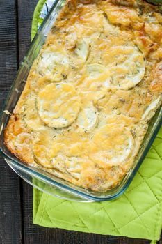 casserole of zucchini squash in a glass form.