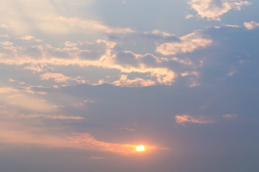 blue sky background with tiny clouds.