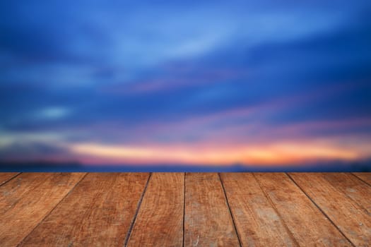 Blue sunset sky and wood floor background, stock photo