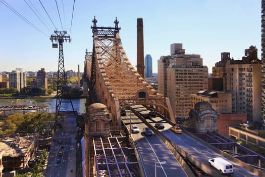 Queensboro Bridge Spanning the East River in New York City on a sunny day