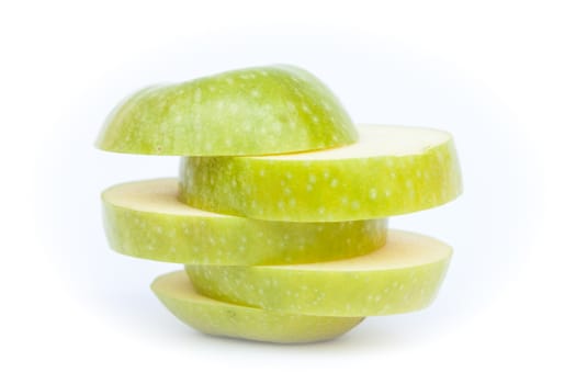 Sliced green apple on white background, stock photo