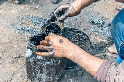 DHAKA, BANGLADESH - August 13: Local workers are working to repair ships in dockyard on August, 13, 2016 in Dhaka, Bangladesh