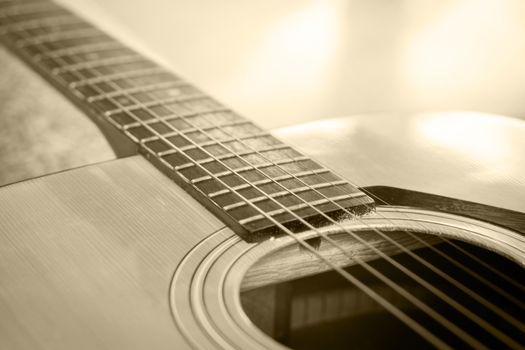 Close up acoustic guitar detail vintage filter, stock photo