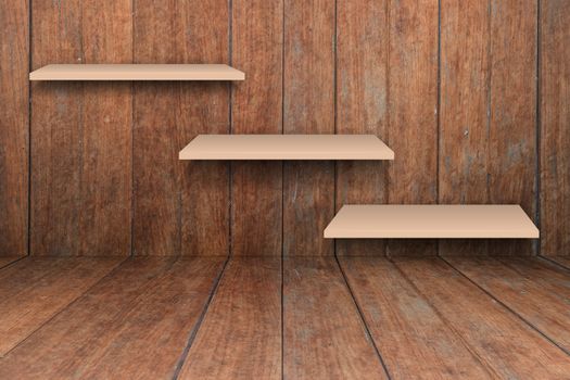 Three brown shelves on wooden interior texture background, stock photo