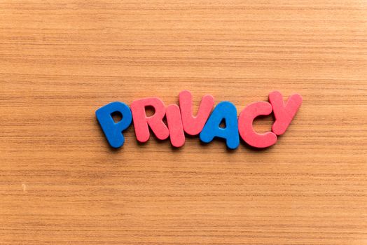 privacy colorful word on the wooden background