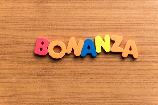 bonanza colorful word on the wooden background