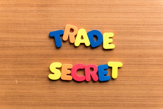 trade secret colorful word on the wooden background