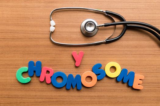 y chromosome colorful word with stethoscope on wooden background