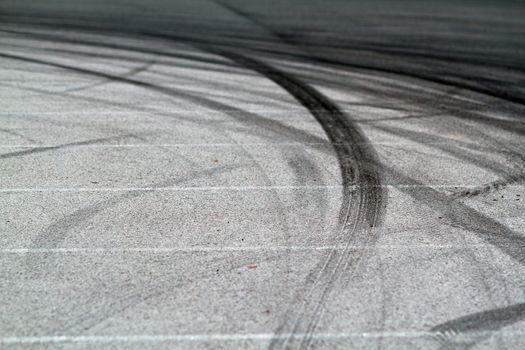 Background with tire marks on road track