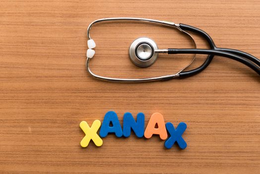 xanax colorful word with stethoscope on wooden background