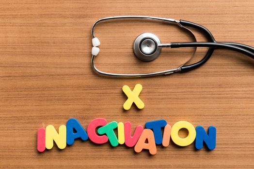 x inactivation colorful word with stethoscope on wooden background