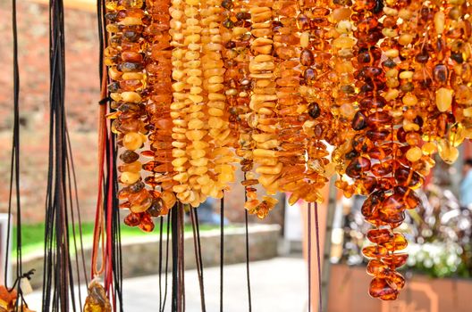 Amber from coast of the Baltic sea selling on the market stall