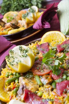 traditional spanish cuisine paella with shrimps and vegetables