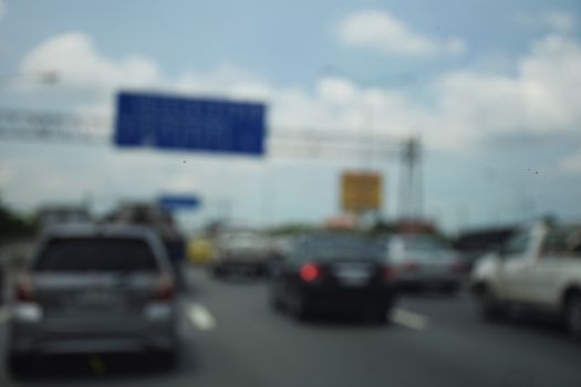 Defocus or blur background with traffic urban road. Inside view.