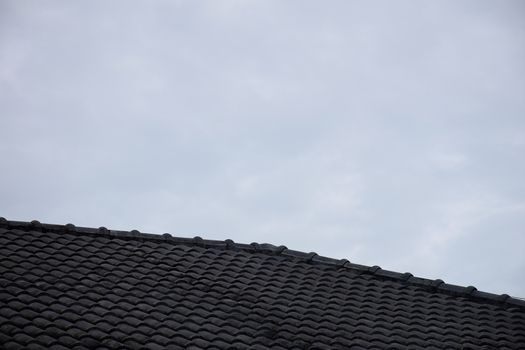 Close up roof texture with blue sky background.