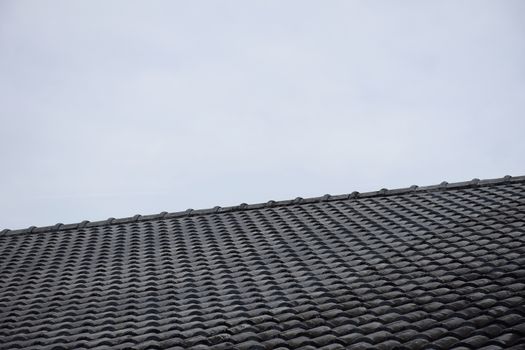 Close up roof texture with blue sky background.