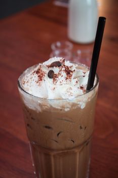 Iced coffee toping with whipped cream, stock photo