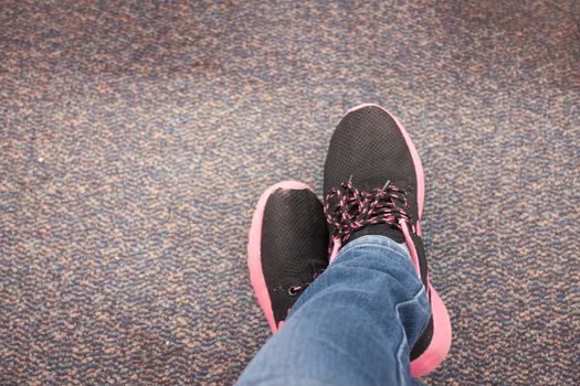 Top view of black shoe on carpet, stock photo