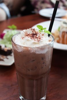 Iced coffee toping with whipped cream, stock photo