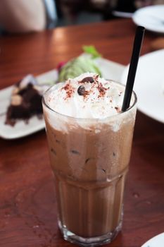 Iced coffee toping with whipped cream, stock photo