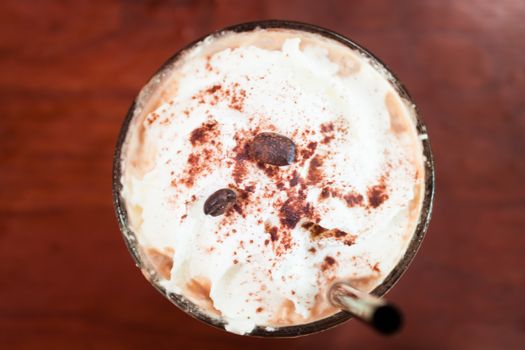 Iced coffee toping with whipped cream, stock photo