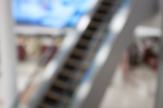 Abstract blurred background of escalator in Airport, shallow depth of focus