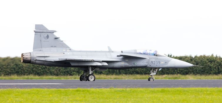 LEEUWARDEN, THE NETHERLANDS-JUNE 10: Modern tactical fighter jet JAS-39 Gripen performs at the Dutch Airshow on June 10, 2016 at Leeuwarden Airfield, The Netherlands.