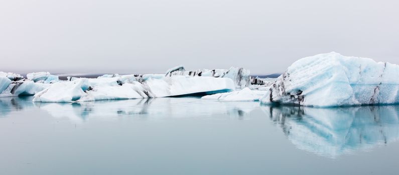 Jokulsarlon is a large glacial lake in southeast Iceland - Ice breaking of a glacier