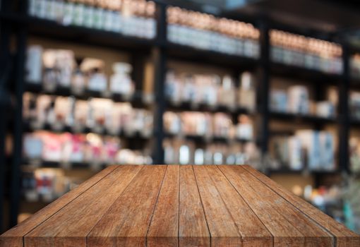 Perspective tabletop wooden with blurred cafe background. product display template