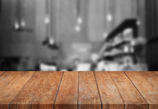 Perspective wooden tabletop with black and white background, stock photo