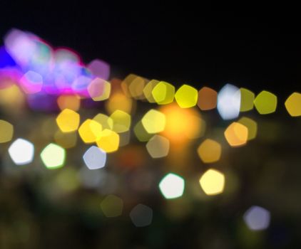 Abstract yellow and violet night lights with blurred background