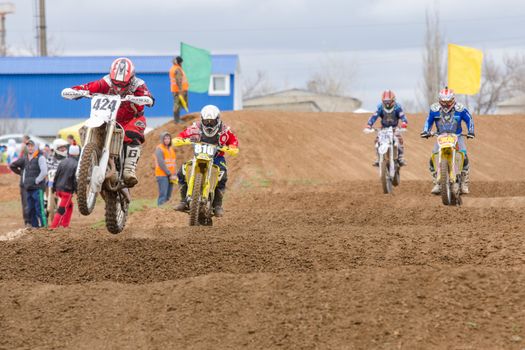 Volgograd, Russia - April 19, 2015: Motorcycle racer on the track, at the stage of the Open Championship Motorcycle Cross Country Cup Volgograd Region Governor