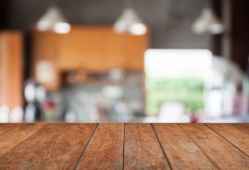 Tabletop with abstract blur coffee shop background, stock photo